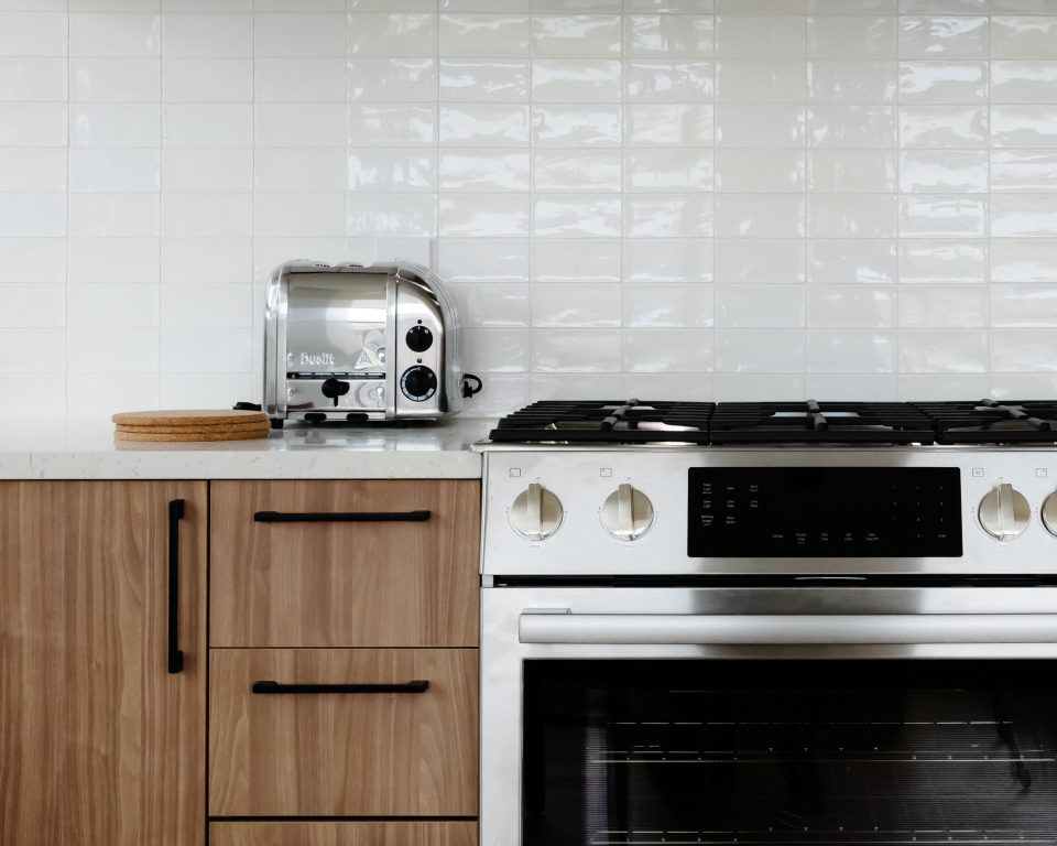 Close up of the stove and cabinetry